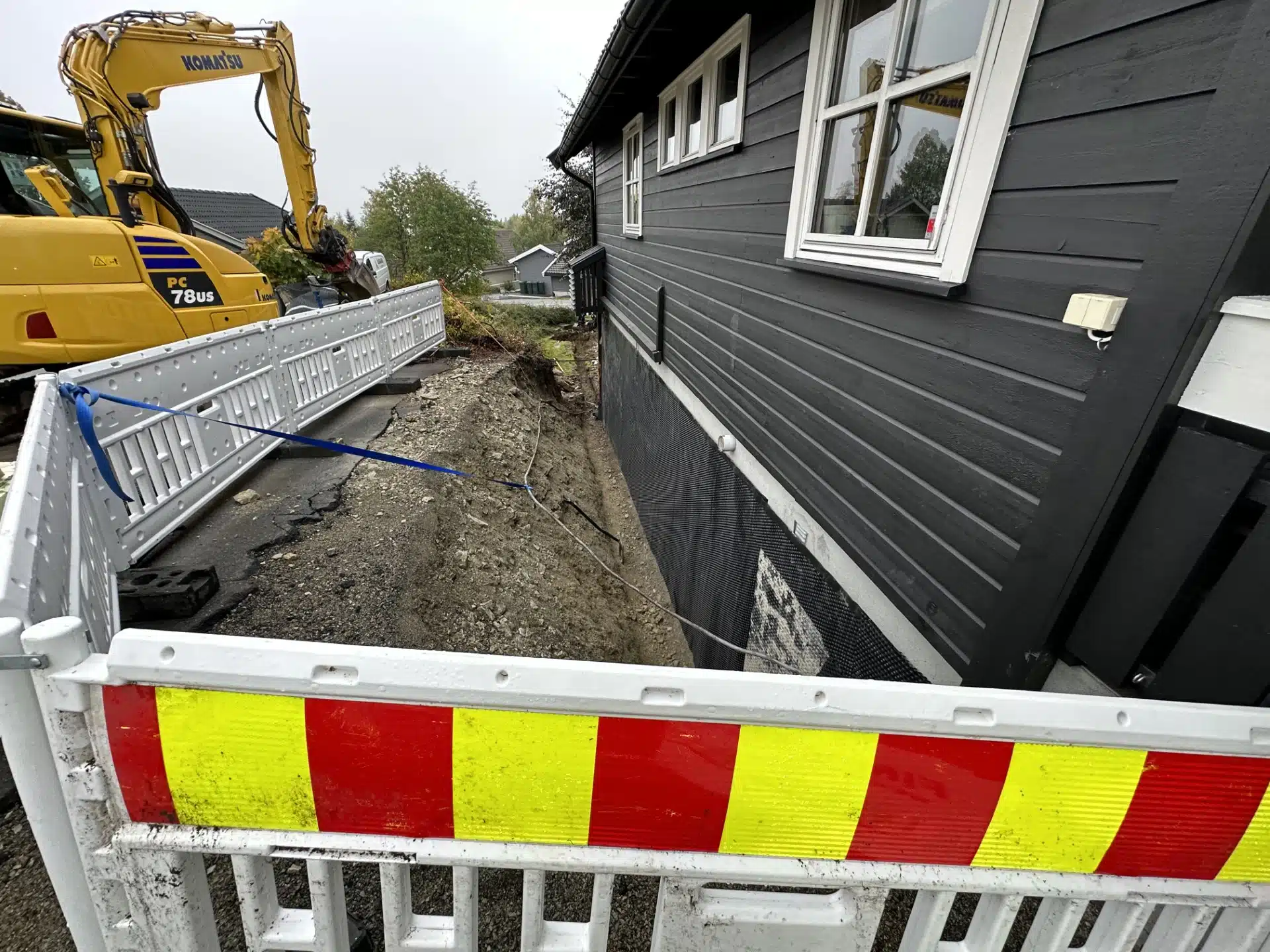 Graving for drenering av grunnmur utført av Åsgard Entreprenør AS i Lier og Drammen